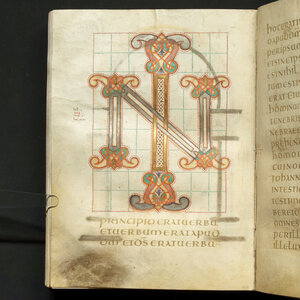 A page from the Nuremberg Chronicle. On it are two colourful illustrated initials N and I transposed onto one another.