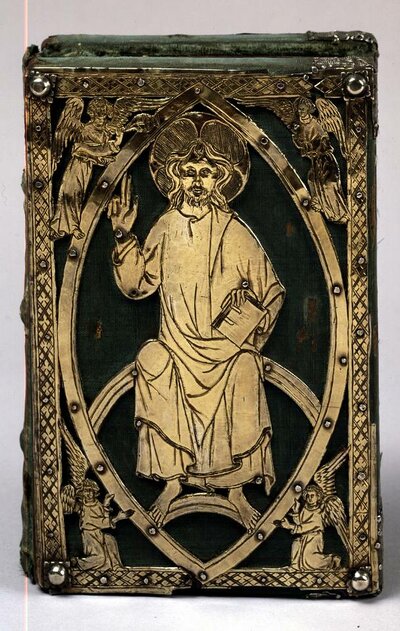 Bucheinband aus schwarzem Samt mit vergoldetem Blech. Dargestellt ein ein Evangelist.