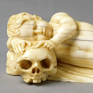  Sleeping Putto with Skull, Netherlands (?),  17th cent., ivory, 4.3 x 14 x 5.7 cm, inv. B 154, © Rheinisches Bildarchiv 